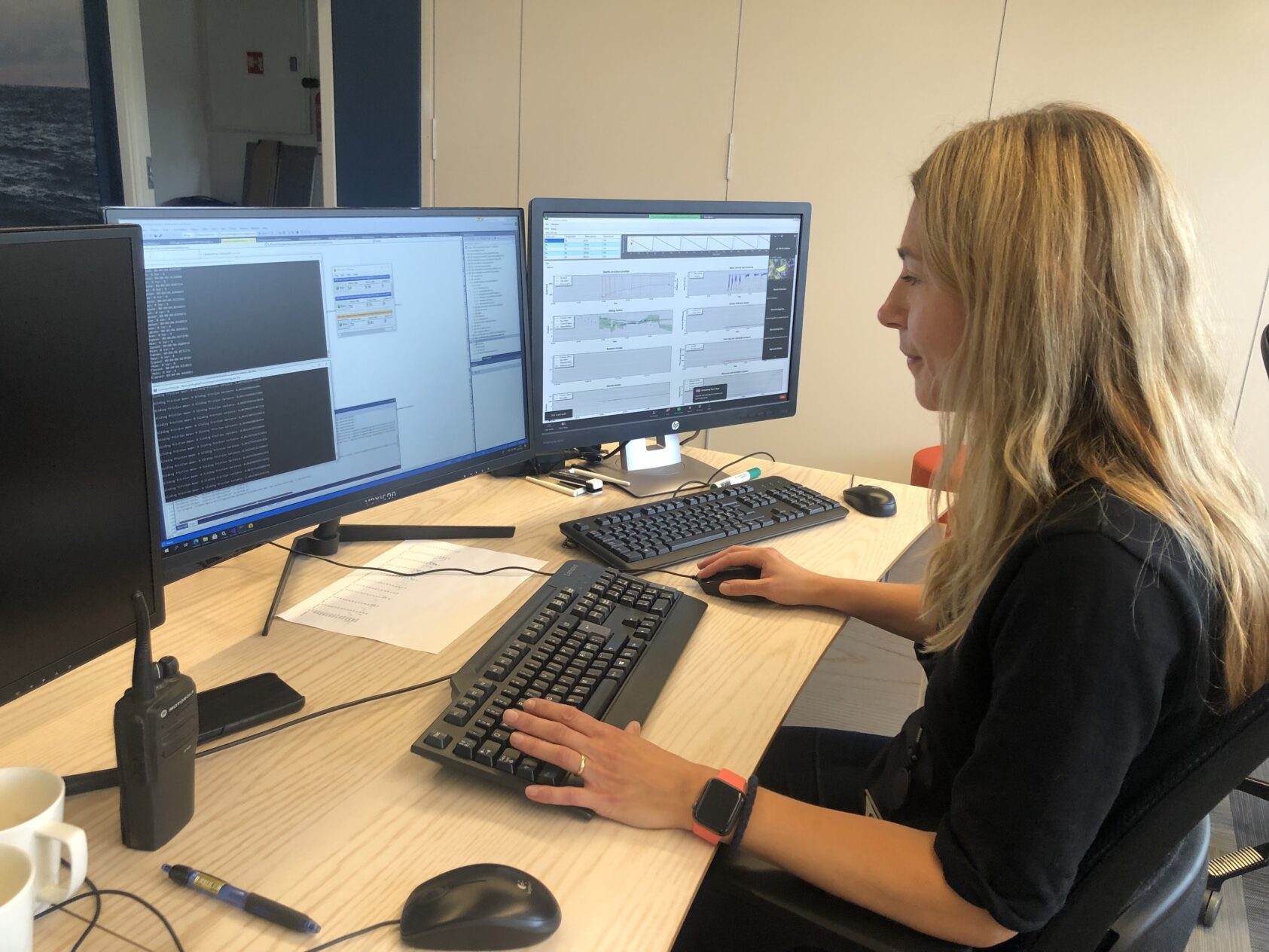 NORCE, Liv Almås Carlsen, senior researcher at NORCE, monitoring autonomous system in the operations room., Carlsen_digital_drilling_IMG 9081, <p>NORCE</p>, Woman working on a computer