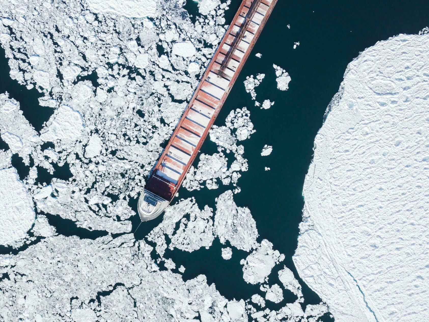 Alex Perz/Unsplash, The thinning and retreating of sea ice have led to increased human activity in Arctic waters. Hence, marine traffic and activities such as fishing, shipping, oil and mineral exploitation are expected to increase in the future. To handle navigation in ice-covered waters, vessel crews need appropriate planning support., Figure 12, , 