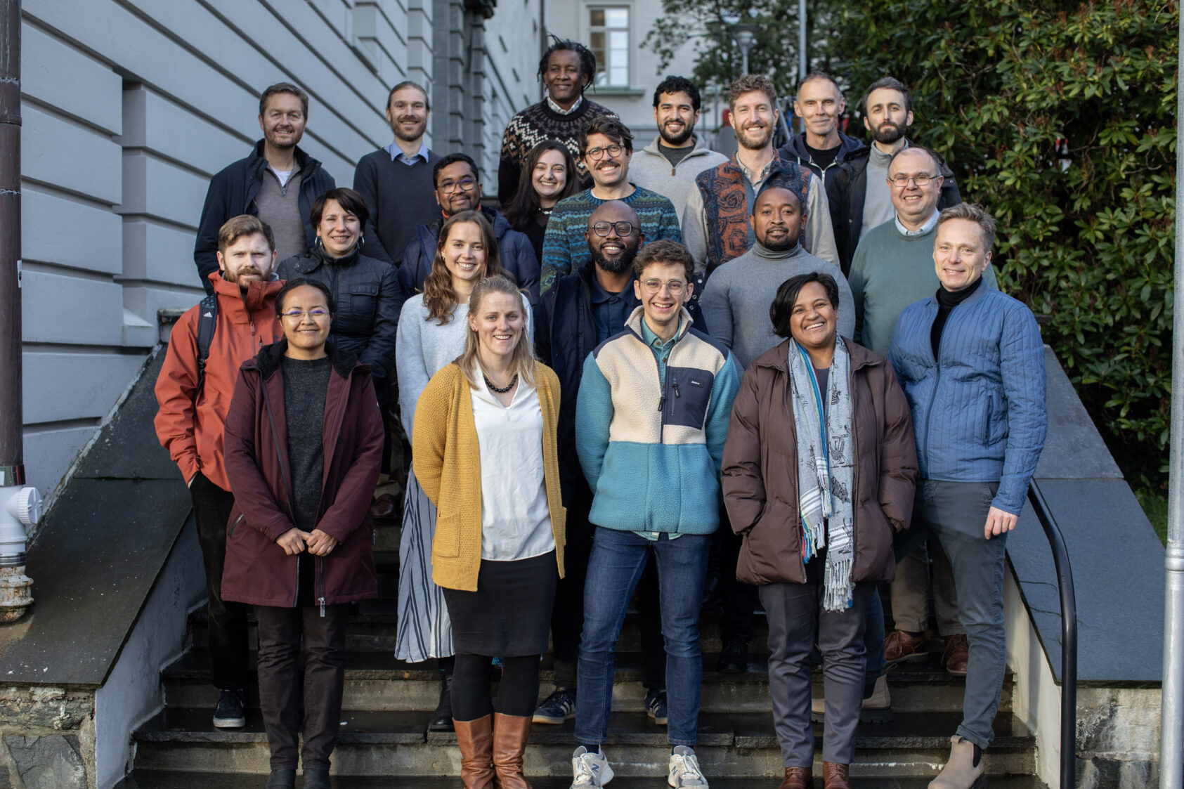 Photo: Thomas Hovmøller Ris, The ACACIA team, Gruppebilde redigert, , Group of people in an outdoor stairway
