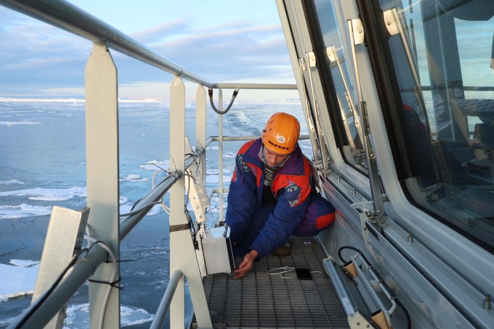 Daniel Albert, GoNorth/SINTEF, Oskar Gjesdal Veggeland works on his sensor platform, outside the bridge, 15 metres above the water line. His PhD project uses the gathering of sea ice data from an array of sensors to demonstrate how various types of observation data can be integrated in an effective way – in this case, to create better sea ice maps., MVI 3317 00 00 27 03 Still001, ,