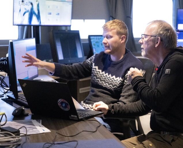 Daniel Albert, GoNorth/SINTEF, Nicky Riber Andreasen (GST) and Lars Rasmussen (GEUS), monitoring the bathymetry data as they come in., IMG 3489, ,