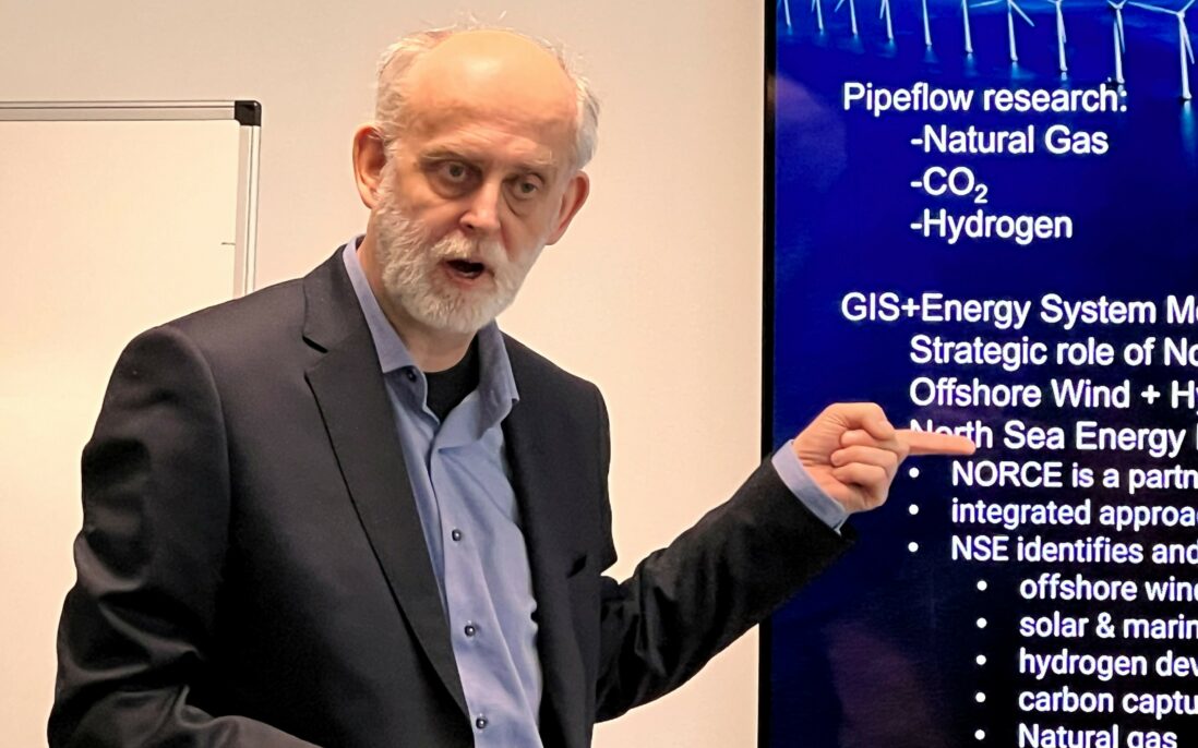 Man points at picture